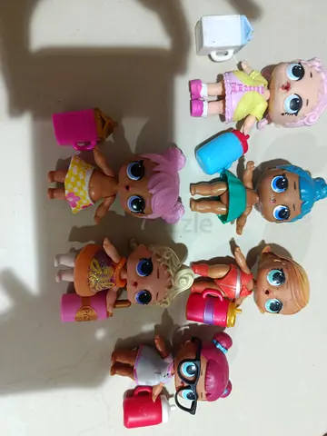 Set of 7 LOL Surprise Baby Dolls with Accessories - Good Used Condition