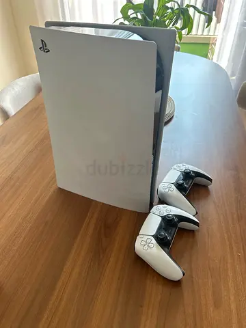 PlayStation 5 Slim Edition + 2 DualSense Controllers (White) - Good Condition. Final price 1500 AED