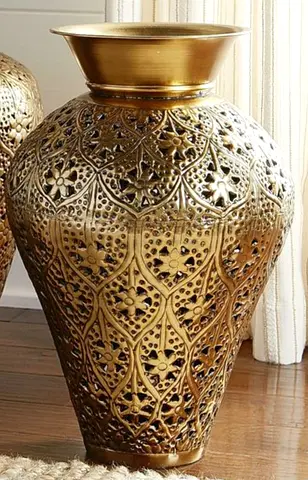 Big metal vase with dry flower