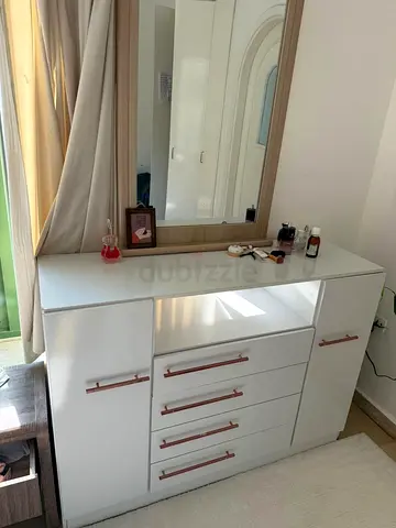 White bedroom dresser with mirror and storage - good condition