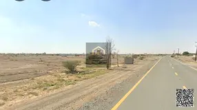 Prime Investment & Residential Opportunity: Corner Residential Plot for Sale in Al Manama Basin 8,
