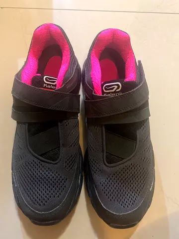 Black slip-on athletic shoes with pink lining - lightly used