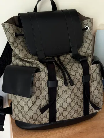 Gucci monogram backpack with leather trim and matching wallet - good condition. Original