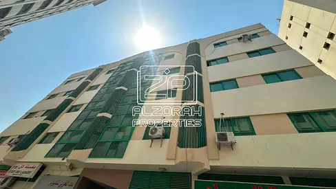 Building with Shops and Apartments for Sale