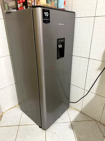 Hisense single-door refrigerator - good condition, water dispenser