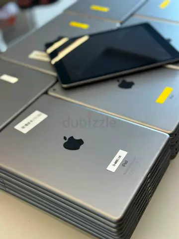 Apple iPad (6th Gen) with 32GB storage. Silver, Wi-Fi model. Includes Touch ID, 9.7-inch Retina