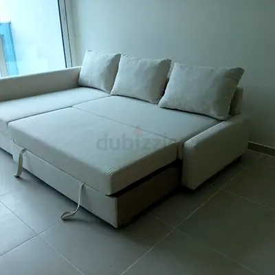 Comfortable Beige L-Shaped Sofa Bed with Pull-Out Extension