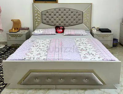 Hardly used Bed King size with matching nightstands - light grey. price is including the mattress.