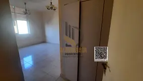 1 Bedroom Apartment for Rent in Al Rashidiya 3 | Balcony & Central AC – AED 26K