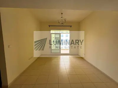1 BR Apartment in Liwan with Covered Parking and Laundry room