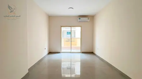 Two bedroom apartment with balcony at a great price easy payment plans near Sharjah and Dubai exits close to all services and port