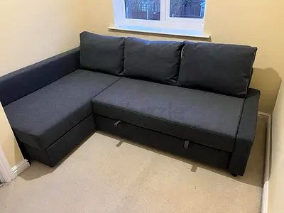 L-shaped grey fabric sofa (3-seater with chaise) — good condition