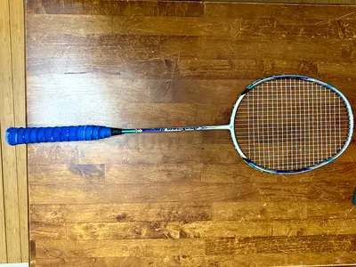 Used badminton racket - lightweight, good condition