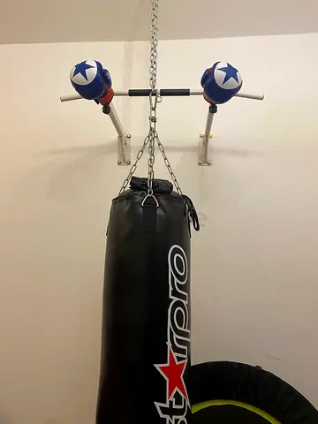 Boxing Bag with Pull up bar and gloves and with trampoline- Very Good Condition