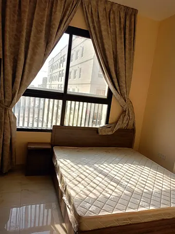 Queen bed frame with mattress and bedside table - good condition