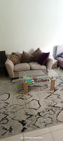 Beige 3-Seater Sofa with Cushions and Glass Coffee Table