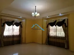 For rent: Beautiful two-story villa in Al Warqa, featuring 5 master bedrooms, a maid's room, a laund