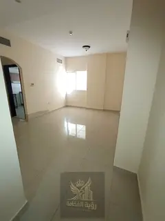 Annual rent in Al Taawun two master bedrooms and living room with two bathrooms kitchen central AC a