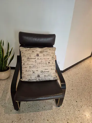 IKEA brown leather poang armchair with cushion