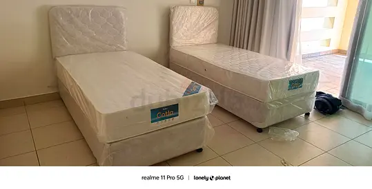 One single beds with mattresses and base brand new