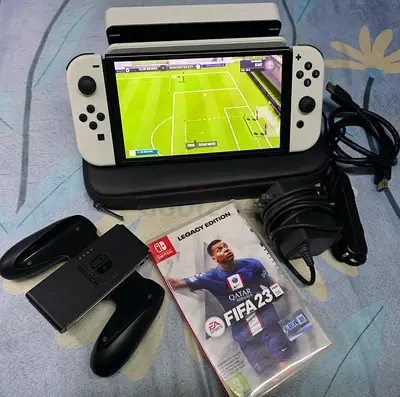 NINTENDO SWITCH OLED +1 GAMES WITH BAG FIFA 23
