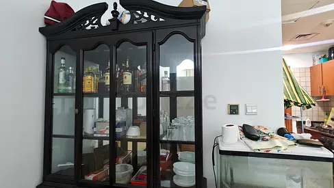 500 AED last price, glass display cabinet/china cabinet-good condition (Only the cabinet top&bottom)