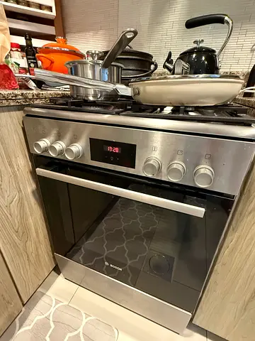 Used freestanding stainless steel gas cooker with oven - good condition