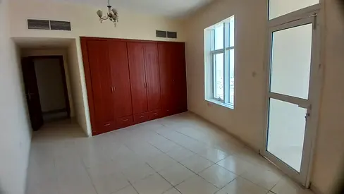 For Annual Rent – Spacious & Elegant 2-Bedroom Apartment with Open Views | Horizon Towers, Ajman