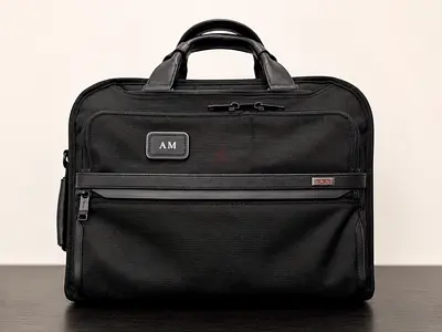 Original TUMI 3-Way Convertible Briefcase in black, purchased recently and in excellent condition