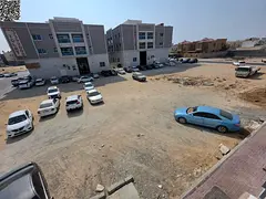 Land for sale, 17,000 sq ft, directly on Al Talah Street and Al Shurooq Mall, in a prime location in