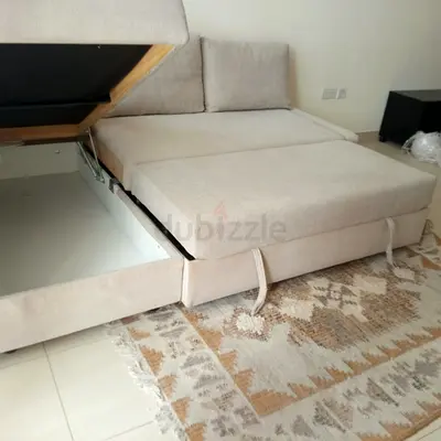 Beige Sofa Bed with Under-Seat Storage
