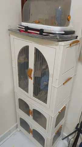Stackable plastic storage cabinet with 3 compartments — white, good condition