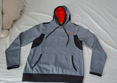 Under Armour ColdGear/Catalyst Sport Hoodie
Color: Gray with orange and black interior
Size: M