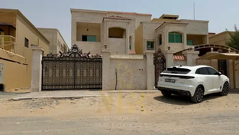 # Villa for sale in Al Muwaihat 2 | Next to the mosque | Street and alley | 5 master bedrooms | External annex