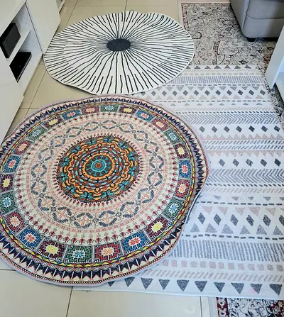 Set of three decorative rugs — round mandala, geometric and floral pieces
