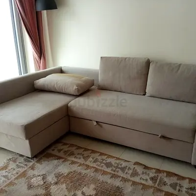 Beige L-shaped Sofa-bed with Storage - Good Condition