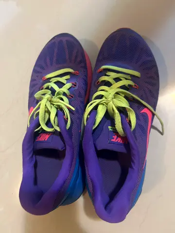 Purple Nike running shoes with neon laces - used
