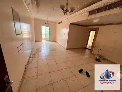 Spacious 2-Bedroom Apartment for Annual Rent in Al Qulayaa with Balcony and Sea View, Prime Location Near Services, AED 40,000 in 4 Payments