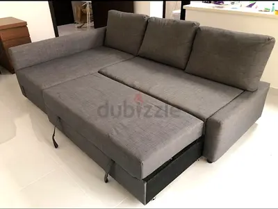 Grey L-shaped Pull-Out Sofa Bed with Storage - Good Condition