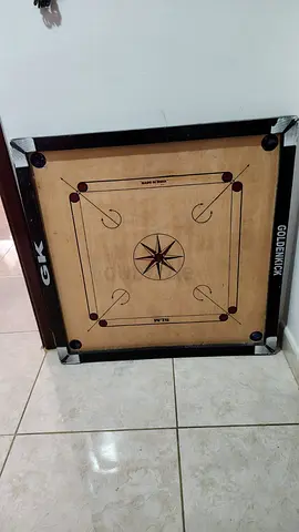 Carrom Board with striker and pieces