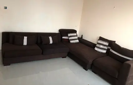 L-shaped brown fabric sectional sofa with chaise - good condition