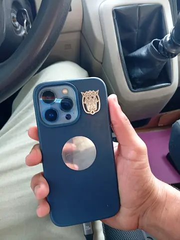 iPhone 13 Pro with MagSafe case and badge (used) - Good condition