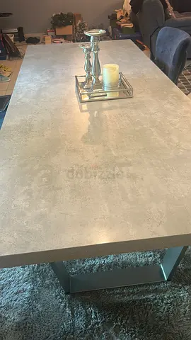 Modern concrete-look rectangular dining table with metal legs