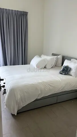 King bed with storage base and high quality mattress - very good condition barely used