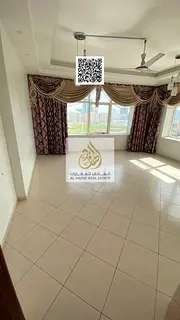 Two-Bedroom Apartment with Separate Living Room – Horizon Towers, Al Rashidiya 1, Ajman