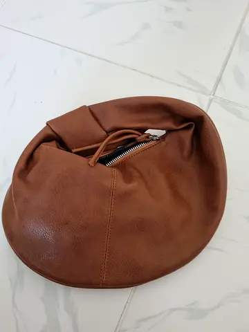 Brown leather crescent shoulder bag