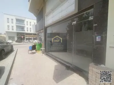 محل تجاري بموقع حيوى ومساحة ممتازة يصلح لإضافة ميزانين للإيجار السنوي على شارع الخرطوم في الروضة 3، عجمان – تسهيلات على 4 دفعات!  فرصة استثمارية وتجار