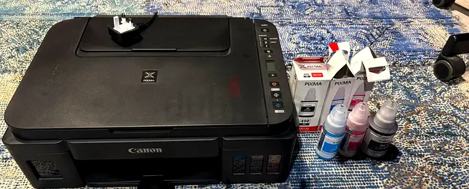 Canon PIXMA All-in-One Ink Tank Printer with Extra Ink Bottles