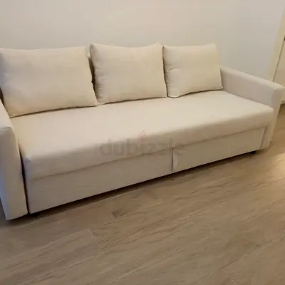 Comfortable 3-Seater Sofa Bed in Cream Fabric