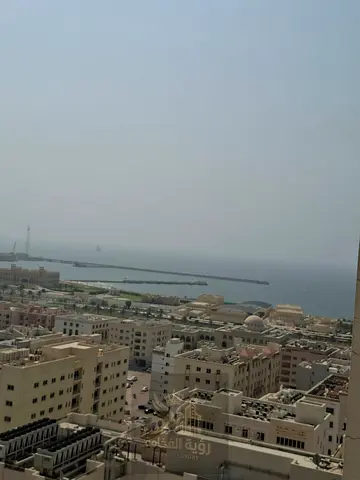 For rent in Al Butina, Sharjah. Two bedrooms and living room, 3 bathrooms, 2 master bedrooms, built-in wardrobes, and sea view. Annual rent AED 45,000